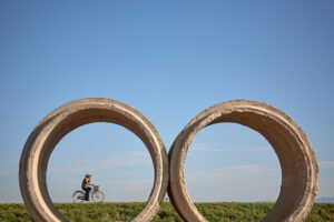 Private Vietnamese cyclist riding into concrete circles